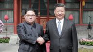 习*近*平与金正恩互致贺电 专家：利益婚姻